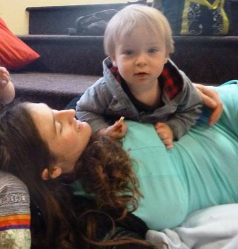 Rengo playing with babies