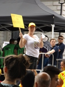 Stephanie protesting - Stop Stealing Our Children Now