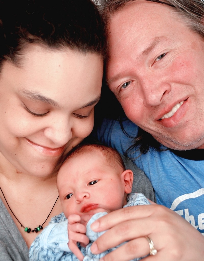 Rembis parents with baby