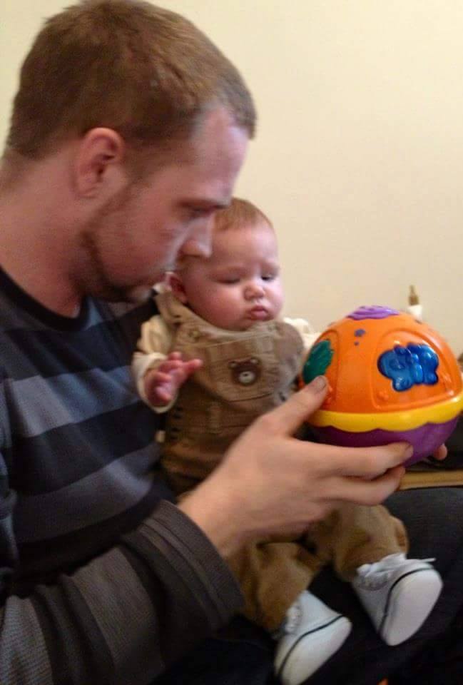 Green playing with son