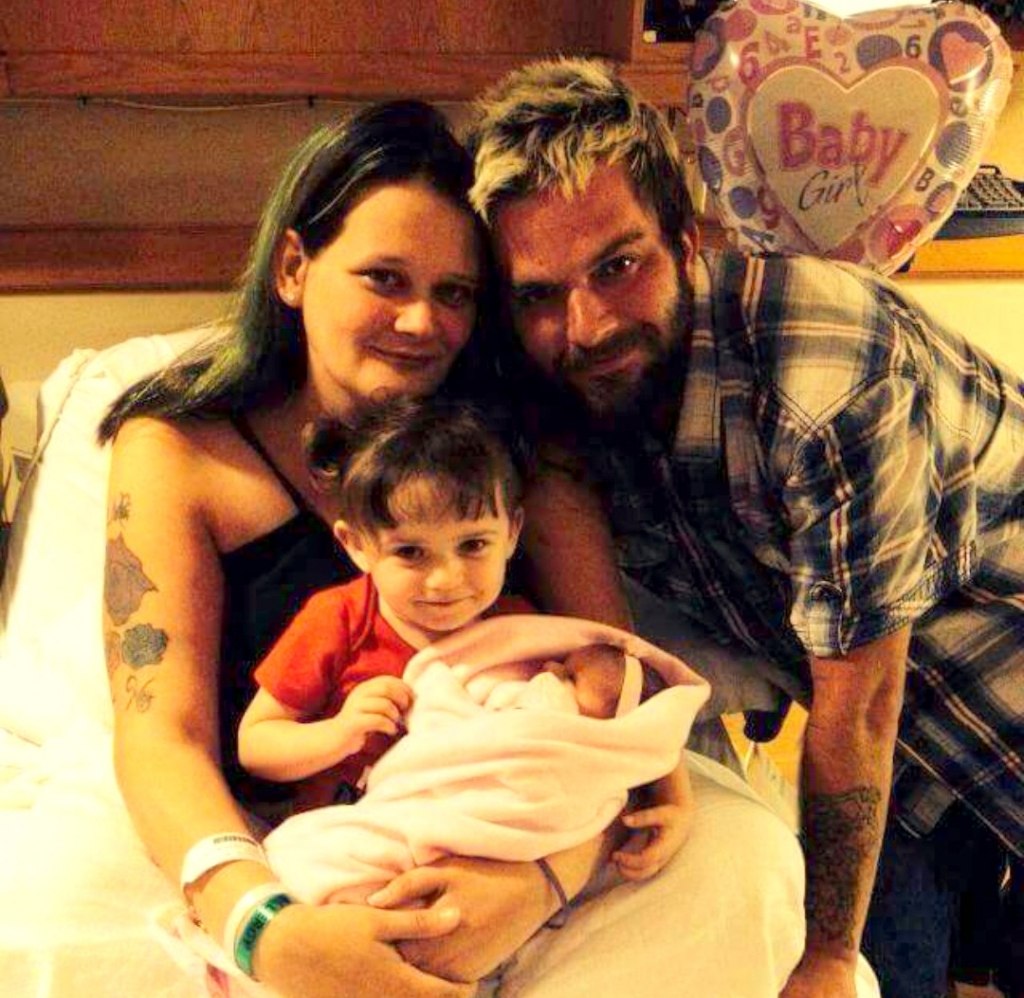 Happy family celebrating the birth of Leigh Ann in May. Nikki, Rodney, Caridie and Leigh Ann before DCS tore their family apart. Photo provided by family.