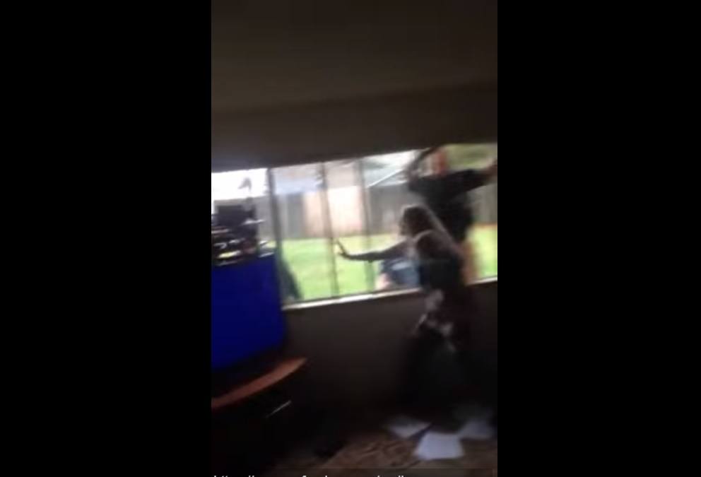 Mother-running-from-Police-coming-in-through-window