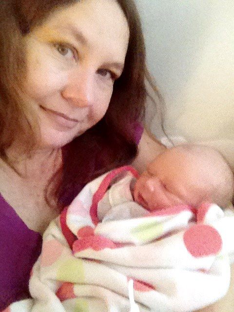 Wallace Michelle_holding_Eva_sleeping