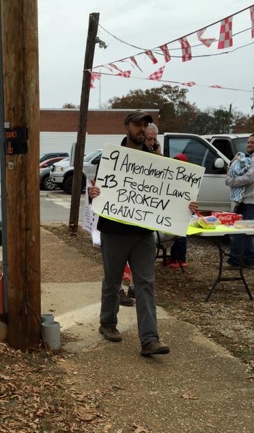 Holm dad sign number of laws broken