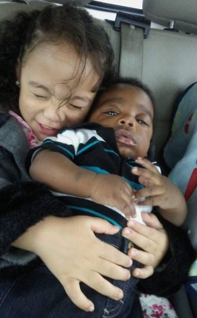 Durenda children hugging