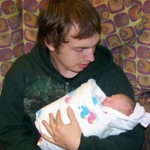 Hailey newborn in daddy's arms