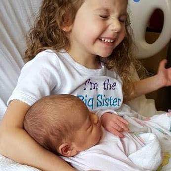 Hailey with baby brother