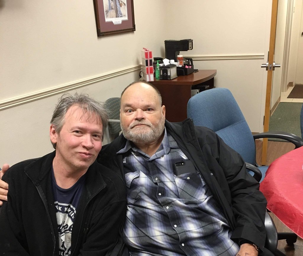 William Rembis with Claire's cousin, Theron French, a retired Lubbock Police Officer.