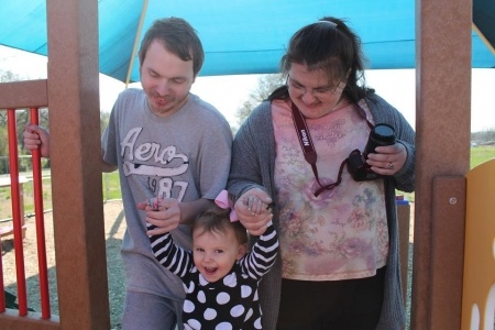 Hailey with dad and grandma
