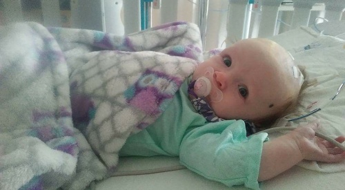 Kelsey baby in hospital eyes open