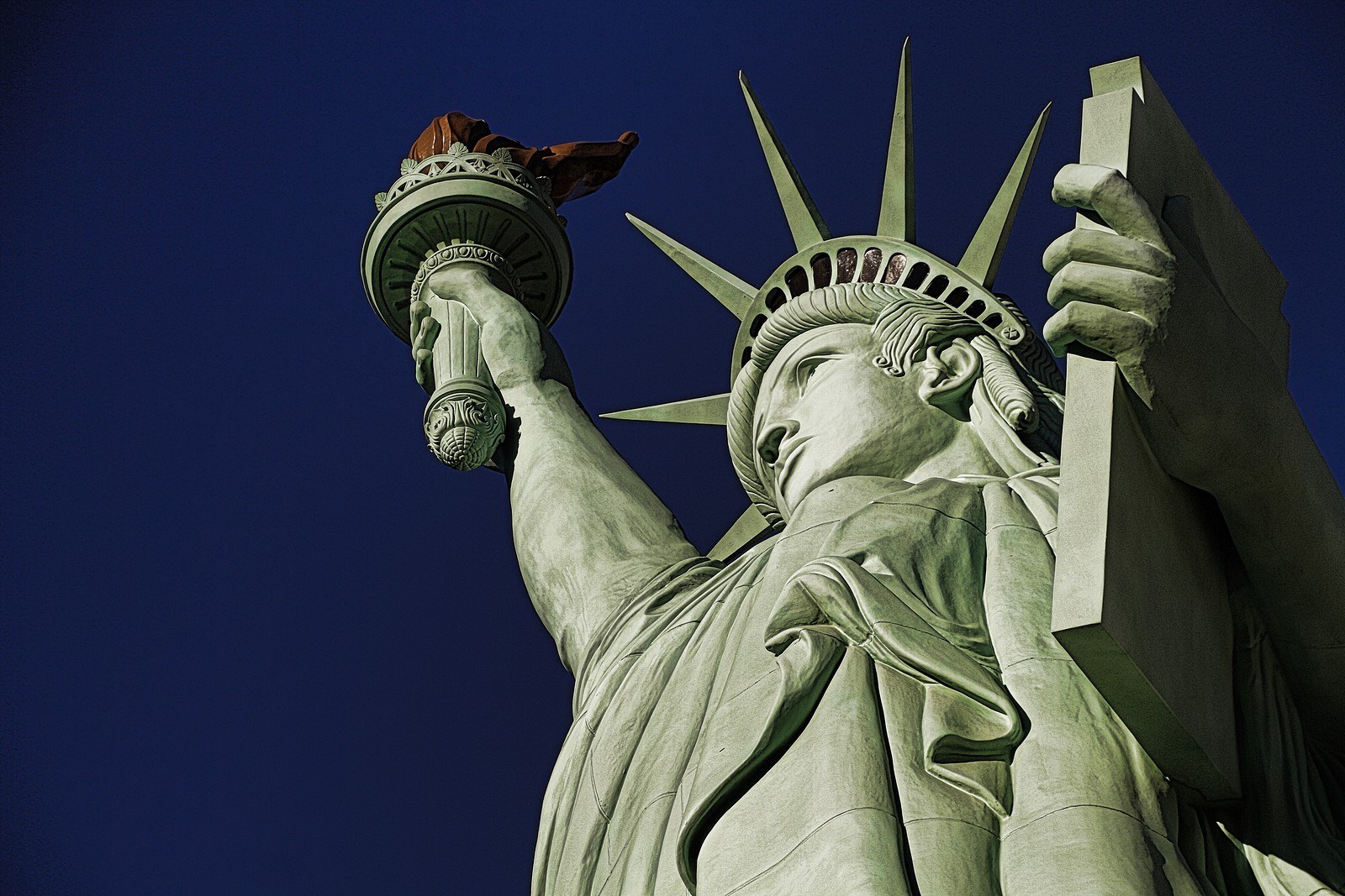 The Statue of Liberty is a colossal copper statue designed by Auguste Bartholdi a French sculptor was built by Gustave Eiffel