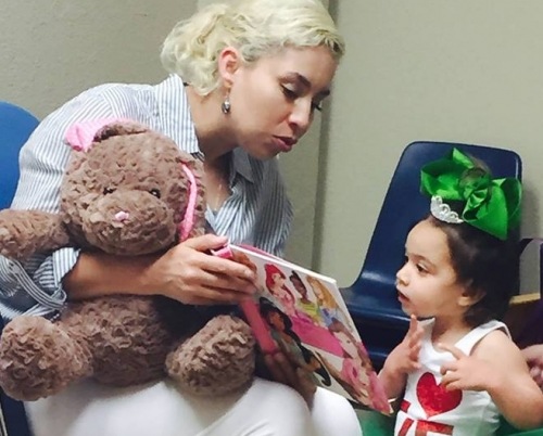 Anita reads to Aniya April 2018