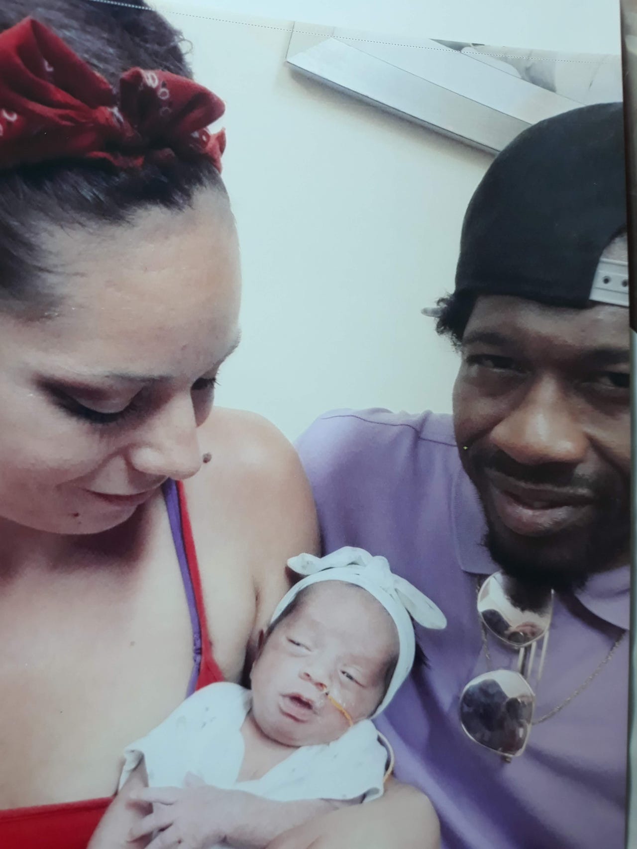 Samora Lesley Cousin with her mother, Jennifer Haley, and her father, Wesley Cousin photo