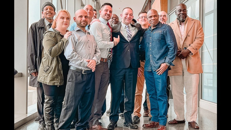 attorney-Chad-LaVeglia-with-plaintiffs-768x432